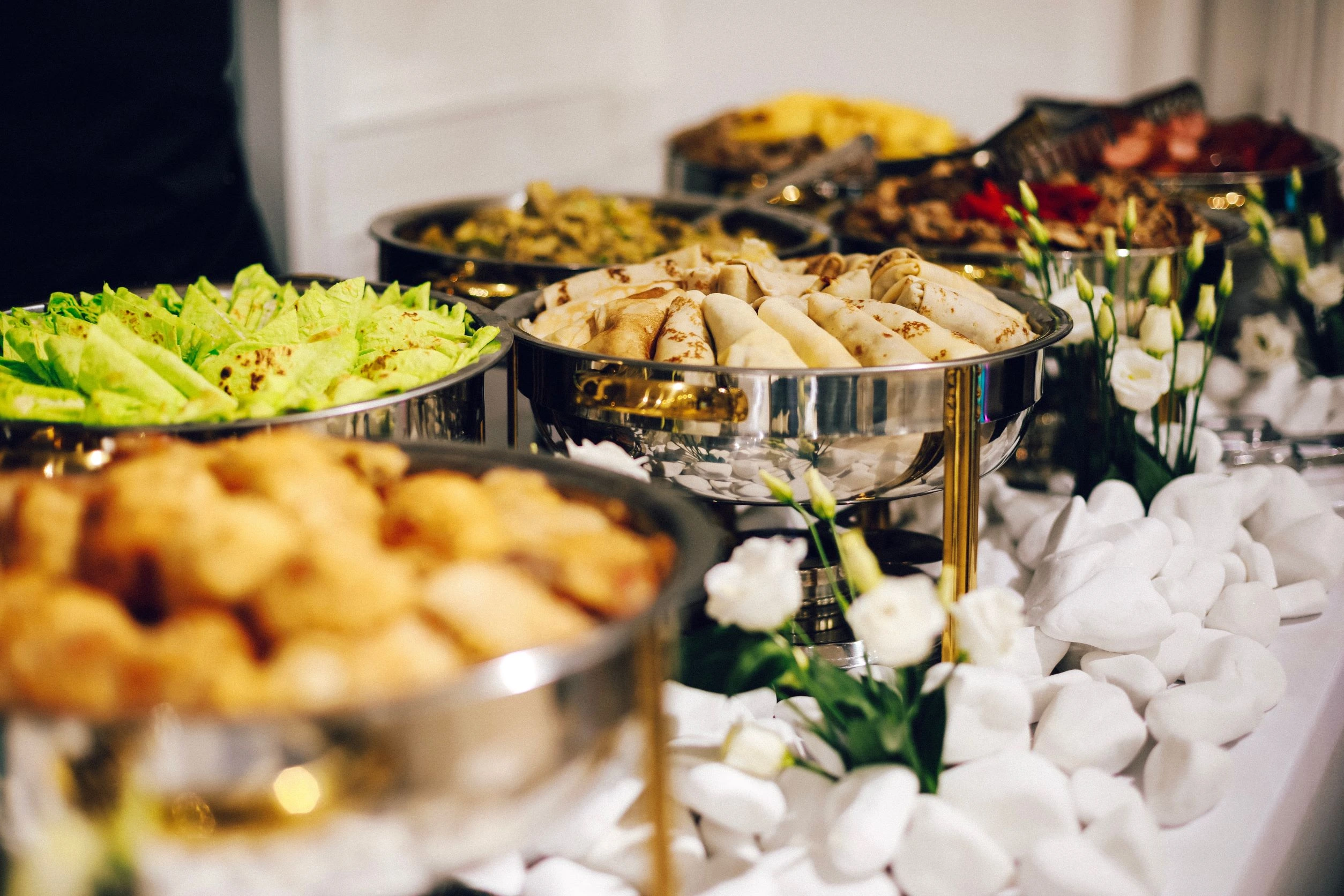 Assortment of catered dishes in buffet style on a table